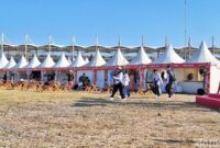 1759232031844-suasana-lapak-umkm-di-antara-tribun-reguler-grandstand-h-dan-premium-grandstand-a-kawasan-sirkuit-internasional-mandalika-lomb_169