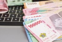 1761716221117-ilustrasi-uang_169