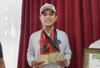 1762191027878-irwan-limardi-menunjukkan-medali-emas-hingga-perunggu-cabor-biliar-porprov-bali-2025-senin-3112025-irwan-menjadi-atlet-dengan--1762183322243_169