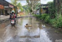 1762277417452-jalan-tergenang-air-1762265372121_169