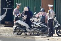 1763141481301-polisi-melakukan-tindakan-tilang-kepada-pelanggar-lalu-lintas-di-jambi-sat-operasi-zebra_169