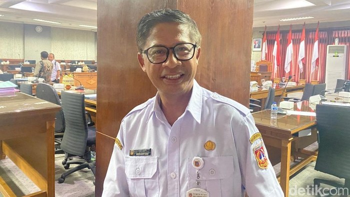 1764176740337-kepala-disdikpora-karangasem-1764169958974_169