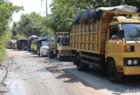 1765170334850-truk-sampah-1757089542558_169