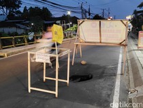 1765299912742-lubang-di-jalan-raya-lukluk-darmasaba-kecamatan-abiansemal-diberi-plang-peringatan-selasa-9122025-1765295279962_43