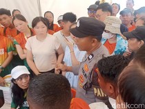 1765796735659-polisi-menenangkan-peserta-bali-health-run-2025-yang-protess-ke-panitia-karena-acara-tak-sesuai-minggu-14122025-1765780507945_43