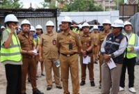 1765861525089-asisten-bidang-perekonomian-dan-pembangunan-kabupaten-badung-ida-bagus-gede-arjana-bersama-tim-melihat-progres-pembangunan-ged-1765857781556_43