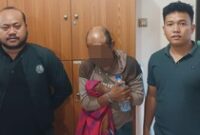 1765883121384-n-42-pelaku-pemerkosa-anak-kandung-di-kecamatan-suralaga-lombok-timur-ntb-ditahan-di-polisi-seusai-ditangkap-di-gianyar-bali-d-1765869520550_43