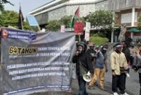 1766120738061-aksi-damai-amp-1766116176152_43